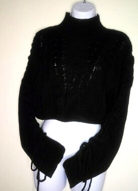 Hera black knit crop sweater with tie cross-cross sleeves